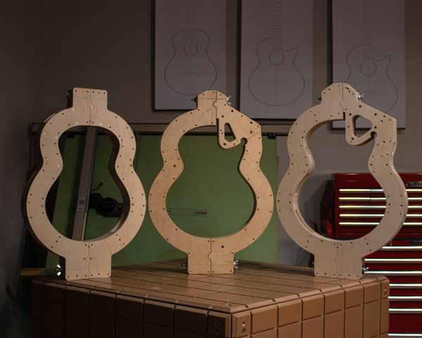RWSA WWS 001 Theunis Fick, Q14A, CNC-cut Moulds with Printed CAD designs in Background RWSA WWS 001 Theunis Fick, Q14A, CNC-cut Moulds with Printed CAD designs in Background